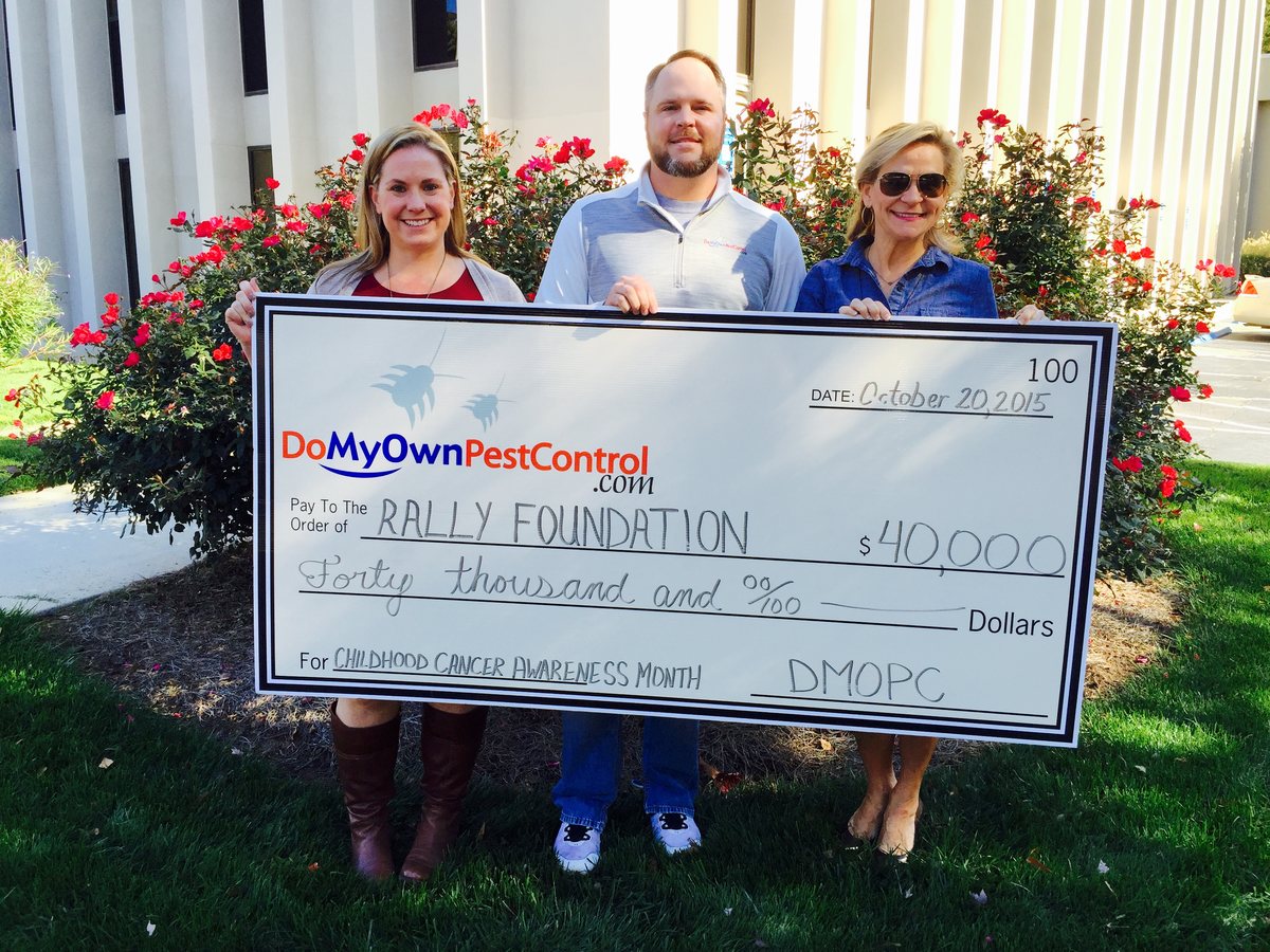 DoMyOwn presenting a $40,000 check to Rally Foundation