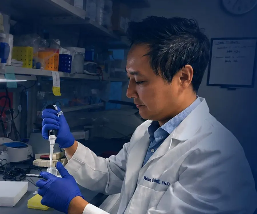 A Rally-funded researcher at work in the lab