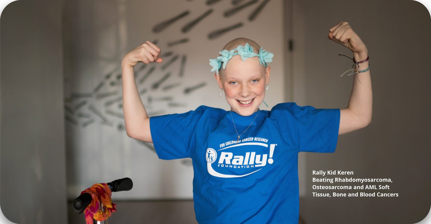 Rally Kid Keren flexing in a Rally shirt