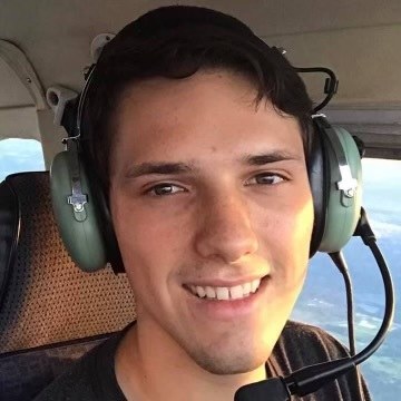 Lane Chancellor in the cockpit of a plane